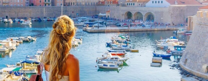 Young Woman Admiring A View Of Dubrovnik, Croatia