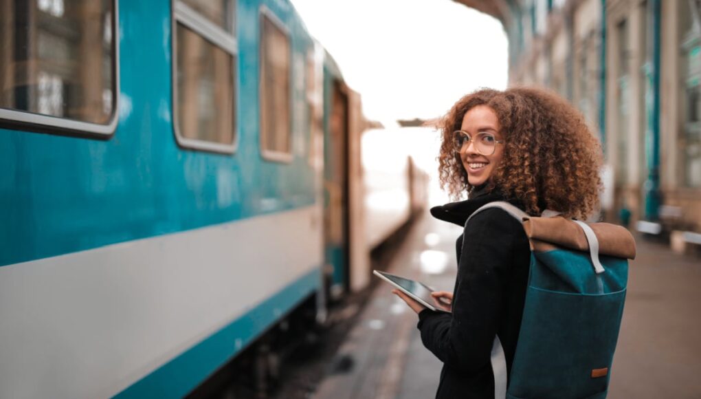 Young traveler at train station in winter