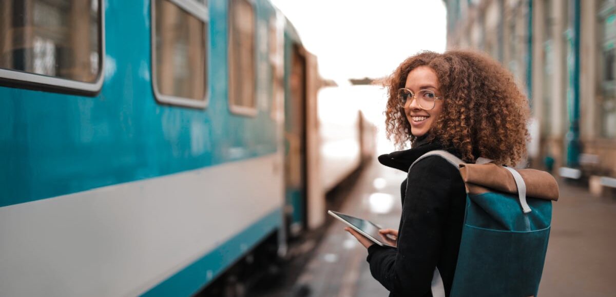 Young traveler at train station in winter