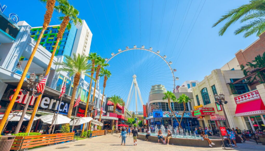 People enjoying Las Vegas attractions on sunny day