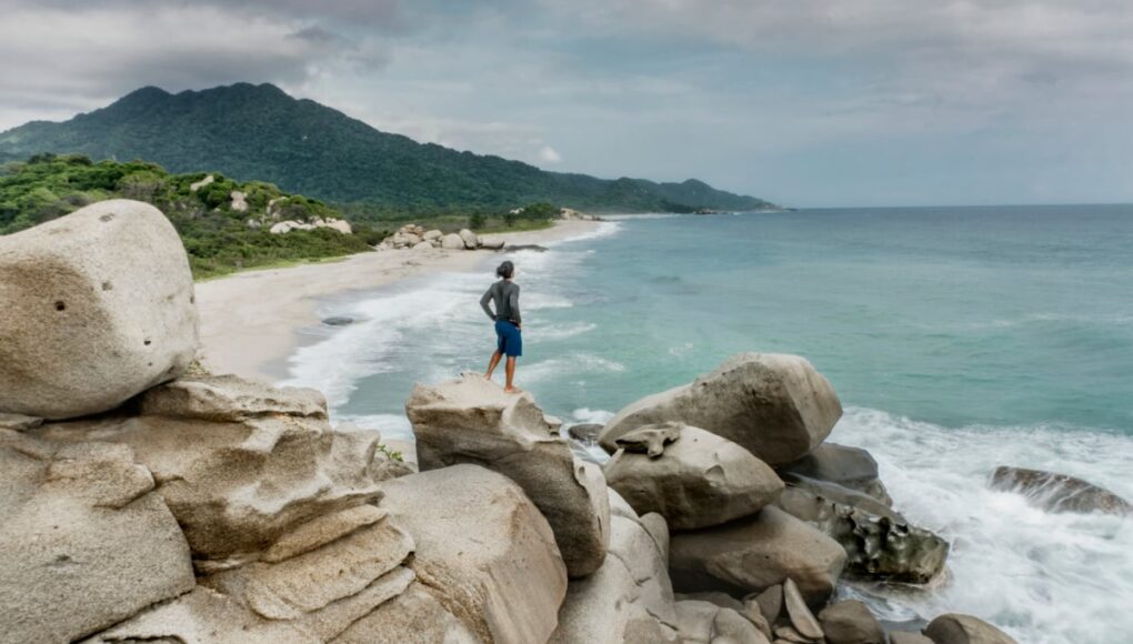 Tourist observing views at Tayrona National Park near Barranquilla