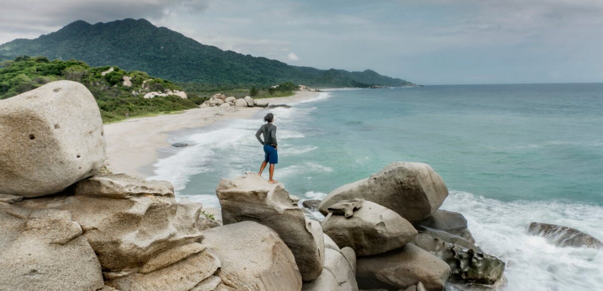 Tourist observing views at Tayrona National Park near Barranquilla