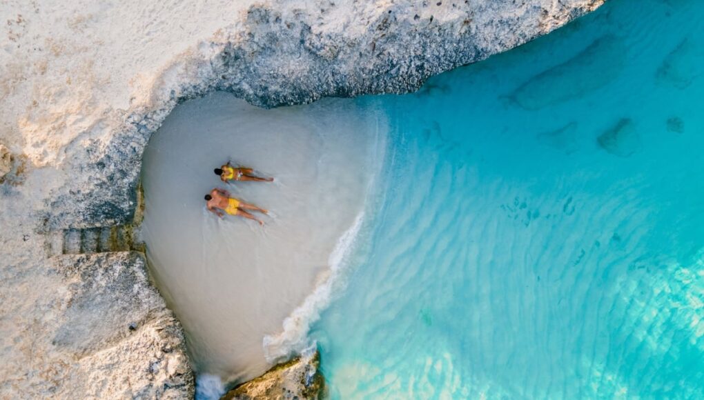 Couple on beach in Aruba