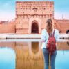 Woman visiting Badi Palace in Marrakesh