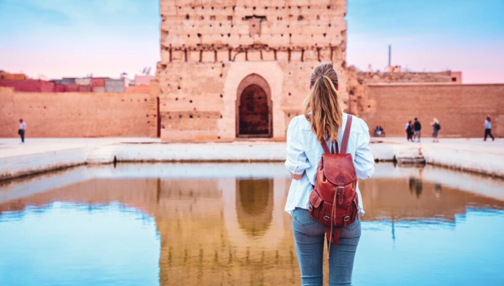 Woman visiting Badi Palace in Marrakesh