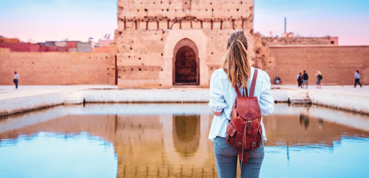 Woman visiting Badi Palace in Marrakesh